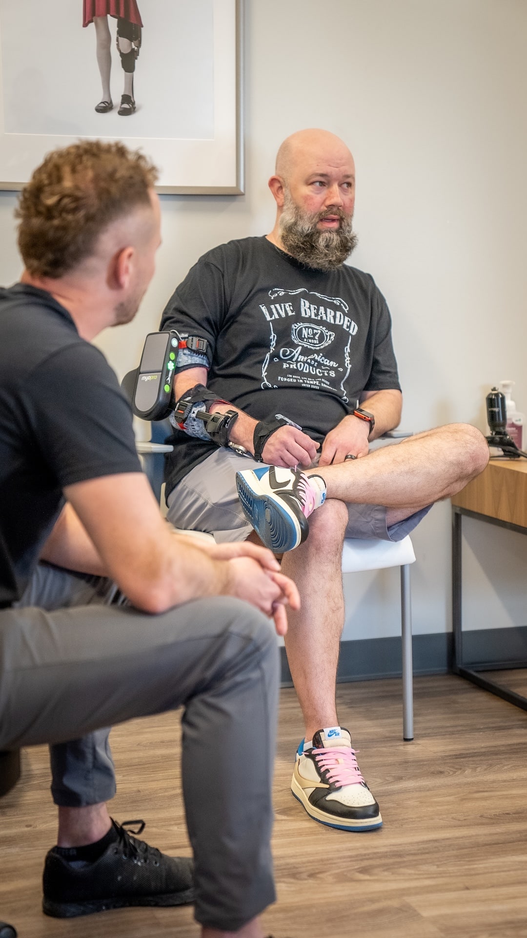 Limb Lab Omaha client with an upper limb orthotic.